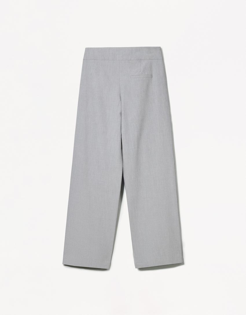 PLEATED BELTED TROUSERS