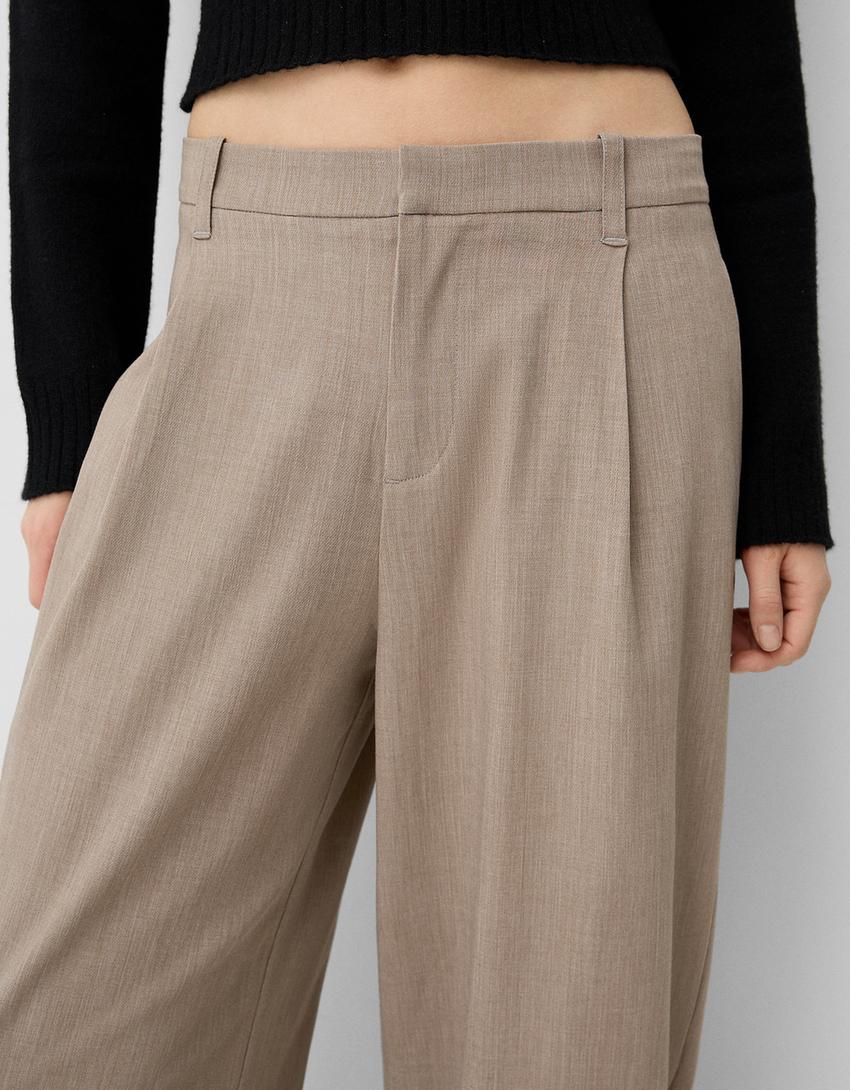 LOW-RISE BAGGY TROUSERS