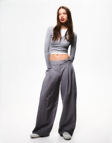 PLEATED BELTED TROUSERS