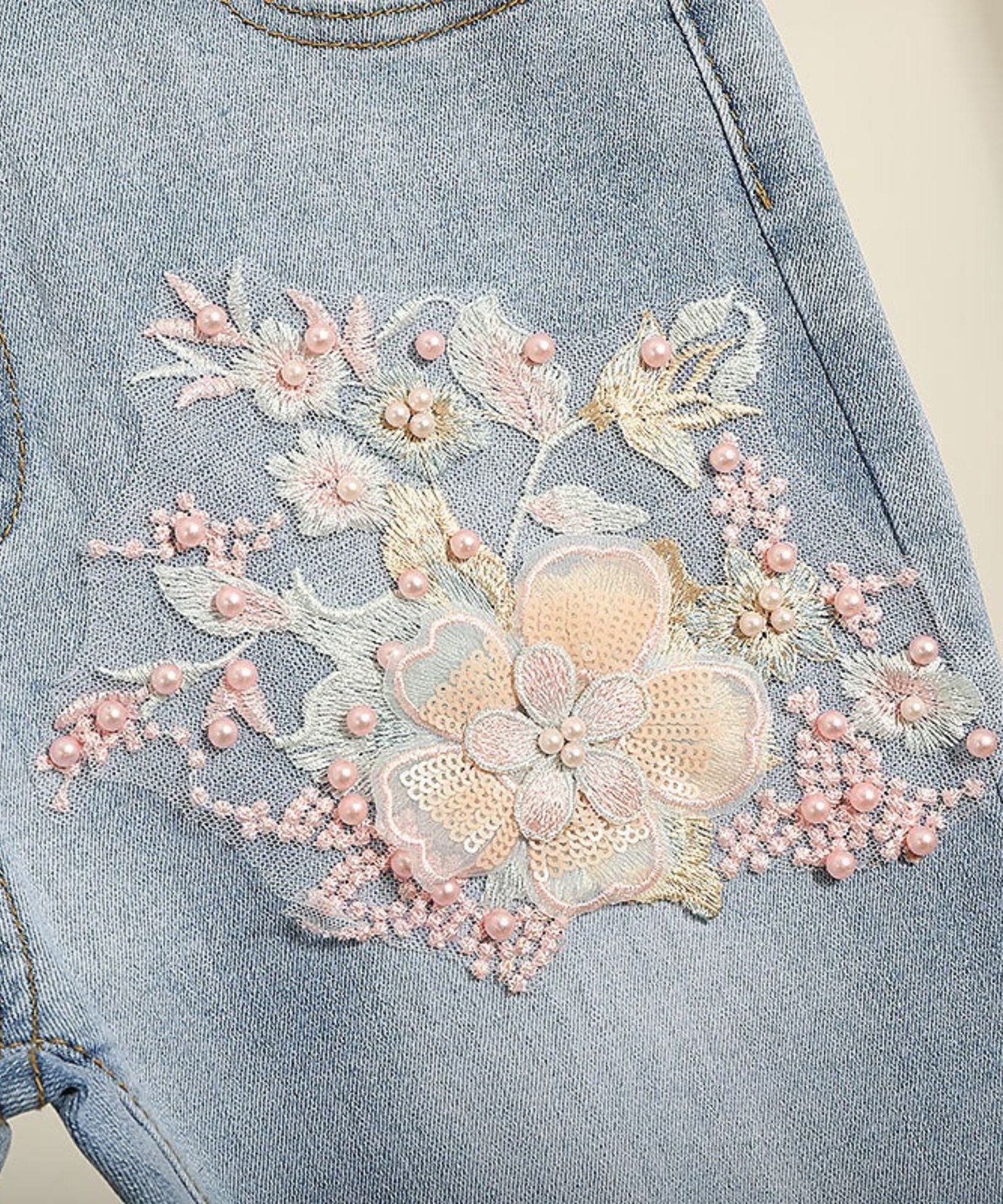 EMBROIDED FLARE JEANS