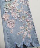 EMBROIDED FLARE JEANS